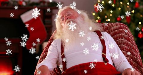 Tired Santa Claus Sleeping with Falling Snowflakes Characterizes Christmas Spirit