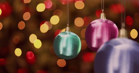 Vibrant Christmas Ornaments with Blurry Festive Lights - Download Free Stock Images Pikwizard.com