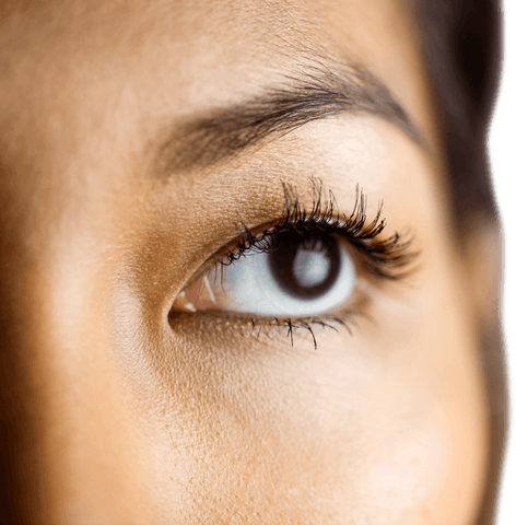 Transparent close-up of businesswoman's eye gazing into distance