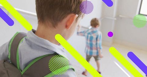 Boys exploring sunlit modern space bright future