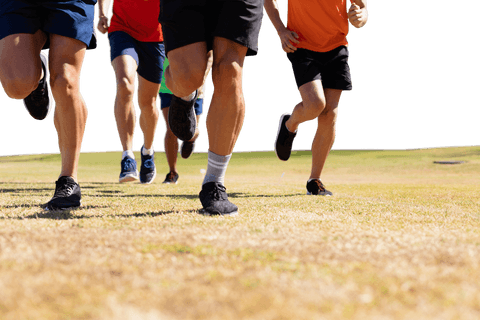Caucasian male soccer players training at stadium on transparent background