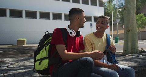 Bonds of Friendship: Youthful Moments Shared Through Laughter in an Urban Setting