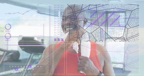 Athlete using fitness technology in modern gym