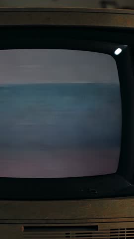 Displaying vintage CRT TV flickering with shifting static bands in vertical retro analog broadcast