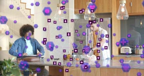 Young men collaborating in modern kitchen with augmented reality social media overlay