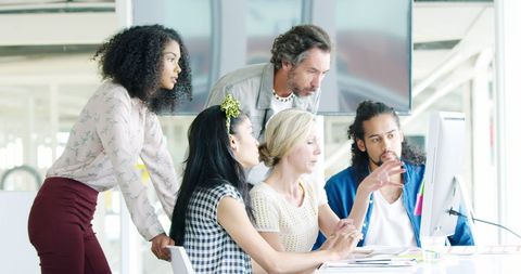 Diverse Team Collaborating on Modern Office Project - Download Free Stock Images Pikwizard.com