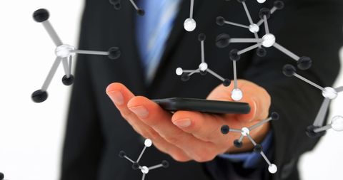 Businessman Using Smartphone with Connected Molecules Overlay