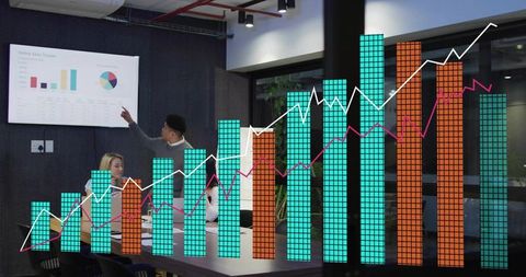 Leading team presenting sales analytics with dynamic bar and line graph overlay