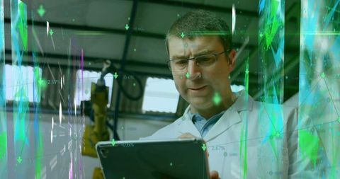 Engineer Analyzing Industrial Data with Modern Technology Overlay - Download Free Stock Images Pikwizard.com