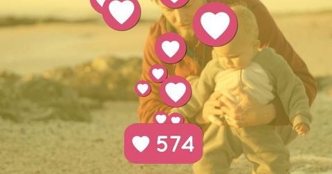 Father and Baby Bonding on Beach with Love Reactions