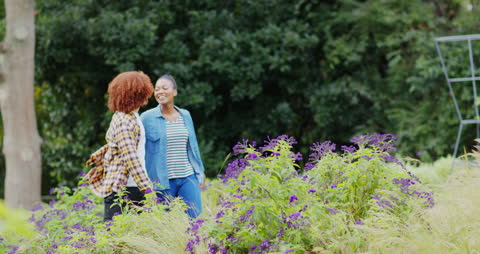 Couple Strolling in Lush Garden Embracing Togetherness