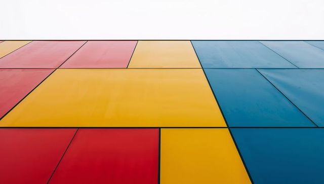 Colorful geometric wall with red, yellow, blue panels