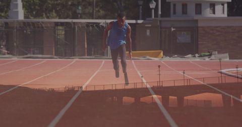 Determined Disabled Runner on Track Reflecting Perseverance - Download Free Stock Images Pikwizard.com