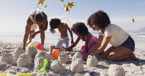 Family Building Sandcastles on Sunny Beach, Kids Playing with Shovels and Beach Ball