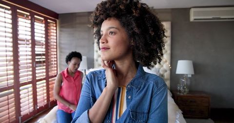 Diverse Female Couple Sharing Intimate Moment at Home