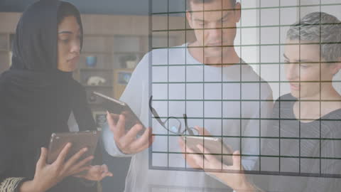 Diverse Colleagues Analyzing Data with Technology Overlay