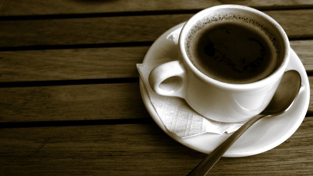 Cup of Hot Coffee with Spoon on Rustic Wooden Table - Download Free Stock Photos Pikwizard.com