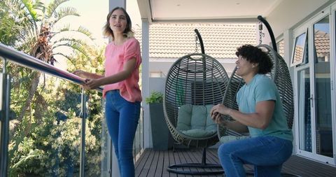 Exciting balcony marriage proposal celebration