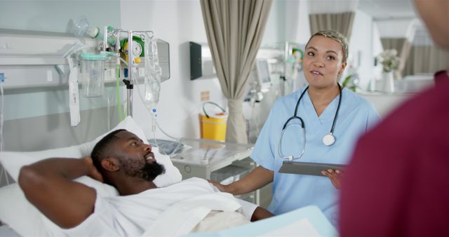 Nurse Consulting Patient in Hospital Bed with Doctor - Download Free Stock Images Pikwizard.com