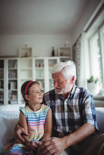 Grandfather Bonding with Granddaughter at Home - Download Free Stock Images Pikwizard.com