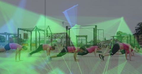 Women Exercising at Outdoor Obstacle Course