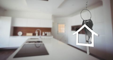New Home Concept with Silver Keys in Modern Kitchen