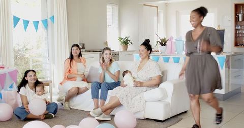 Diverse Group of Friends Celebrating Baby Shower