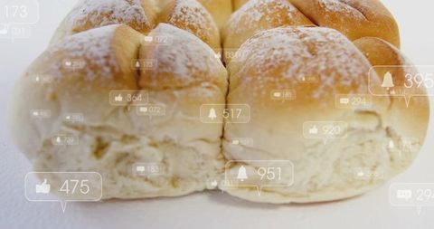 Displaying soft dinner rolls with social media like, bell and comment icon overlays