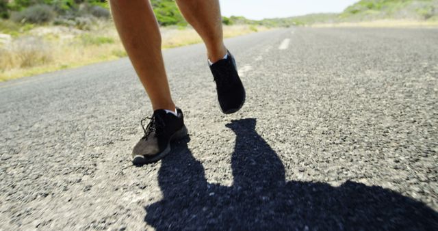 Close-up of Legs Running on Open Road - Download Free Stock Images Pikwizard.com