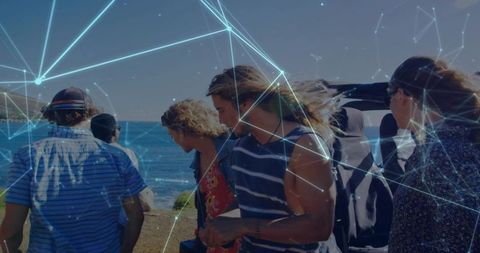 Friends walking along coastal road with car trunk and digital network overlay