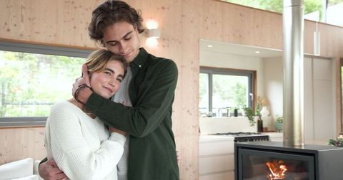 Romantic Couple Embracing in Cozy Modern Living Room