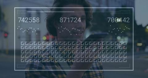 Man Dictating Into Smartphone in Urban Location With Data Overlay