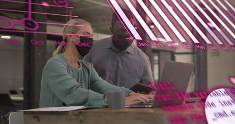 Collaborating colleagues wearing masks with laptop and pink calendar overlay reflections