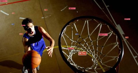 Basketball Player Dunking Ball with Digital Overlays Highlighting Intensity