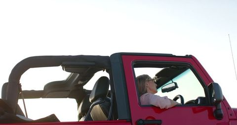 Woman Driving Red Convertible at Sunset Road Trip Adventure - Download Free Stock Images Pikwizard.com