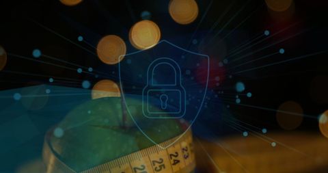 Digital security over healthy diet concept: lock and apple