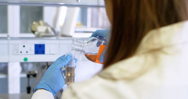 Scientist Conducting Experiment in Modern Laboratory Setup - Download Free Stock Images Pikwizard.com