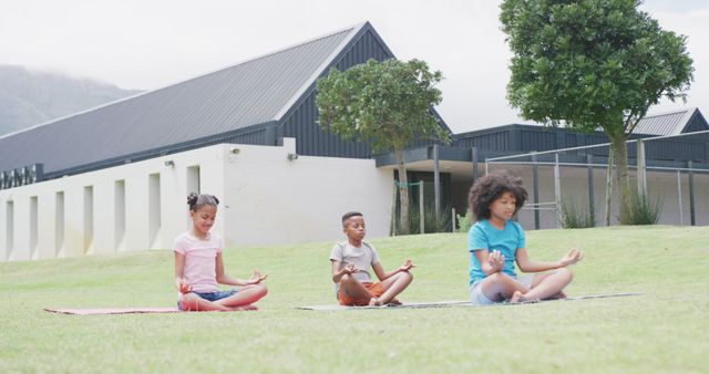 Children Practicing Yoga Outdoors on Yoga Mats at School - Download Free Stock Images Pikwizard.com