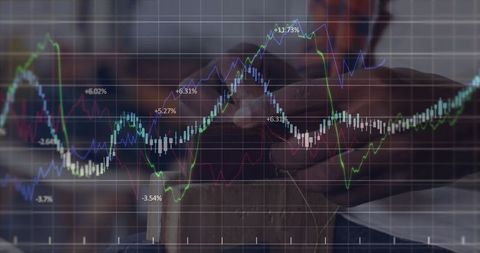 Man Analyzing Financial Charts on Smartphone at Wooden Desk