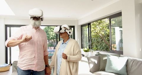 Senior Couple Exploring VR Technology at Home