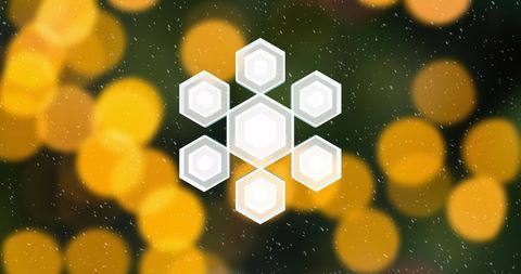 Festive Snowflake Decor with Orange Bokeh Lights