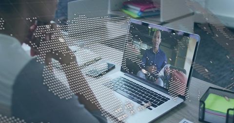 Virtual Business Meeting on Laptop in Home Office Setting