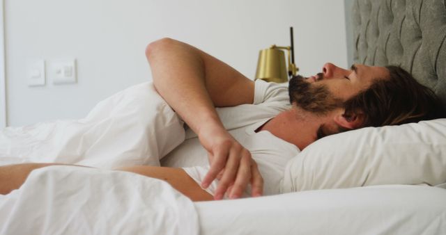 Man Relaxing in Bed with Eyes Closed, Peaceful Rest Concept - Download Free Stock Images Pikwizard.com