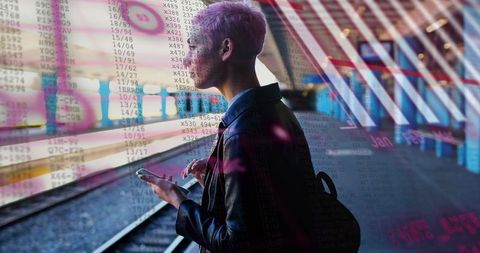 Commuter checking phone on rail platform with digital code overlay and steel architecture