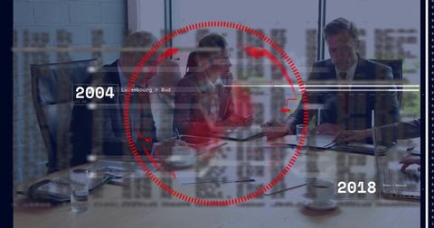 Corporate executives collaborating around conference table with data hud timeline 2004–2018