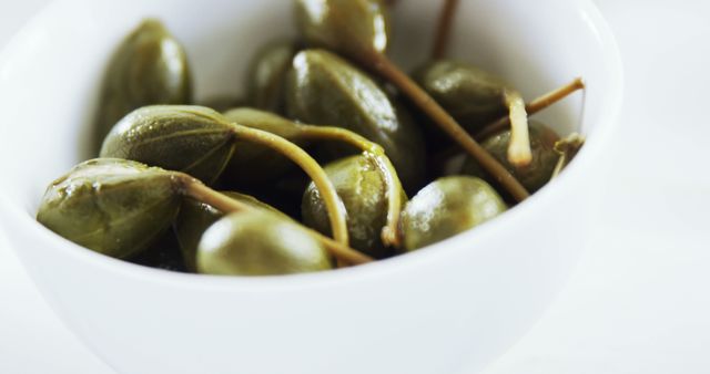 Fresh Green Capers in White Bowl on Light Background - Download Free Stock Images Pikwizard.com