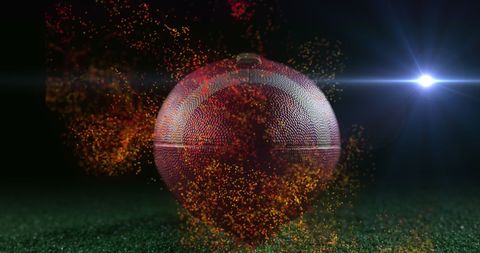Digital Composite of Sparkling Rugby Ball with Lens Flare on Field