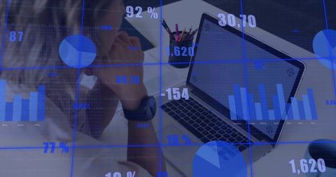 Business professional analyzing data with technology tools in modern office