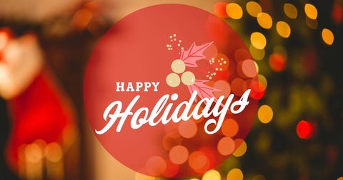 Festive Happy Holidays with Blurred Holiday Lights and Decor