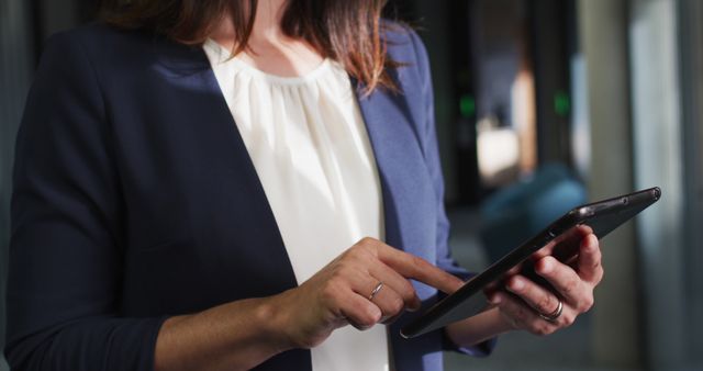 Businesswoman Using Tablet in Office - Download Free Stock Images Pikwizard.com